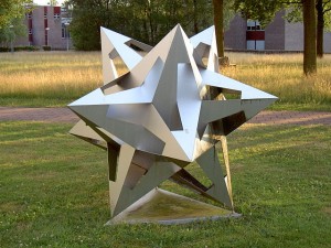 Sculpture of the small stellated dodecahedron that appears in Escher's Gravitation. It can be found in front of the "Mesa+" building on the Campus of the University of Twente.