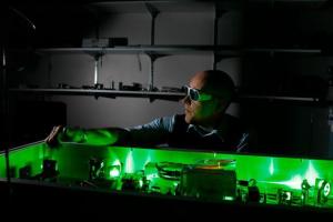 Caption: This is professor Siwick tweaking up the laser in his McGill University lab. Credit: Allen McInnis for McGill University