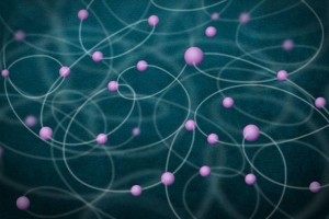 This image illustrates the entanglement of a large number of atoms. The atoms, shown in purple, are shown mutually entangled with one another. Image: Christine Daniloff/MIT and Jose-Luis Olivares/MIT