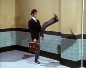John Cleese as a Civil Servant in the Ministry of Silly Walks. Screenshot from Monty Python's Flying Circus episode, Dinsdale (Alternate episode title: Face the Press). Ministry_of_Silly_Walks.jpg ‎(300 × 237 pixels, file size: 14 KB, MIME type: image/jpeg) [downloaded from http://en.wikipedia.org/wiki/File:Ministry_of_Silly_Walks.jpg]