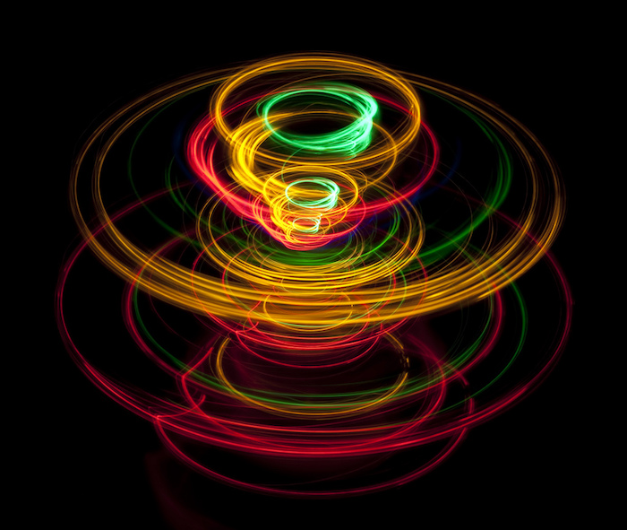 Vivid lines of light tracing a pattern reminiscent of a spinning top toy Courtesy: Harvard University